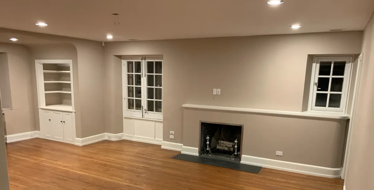 Finish-detail inspiration with painted trim, molding, and hardwood flooring