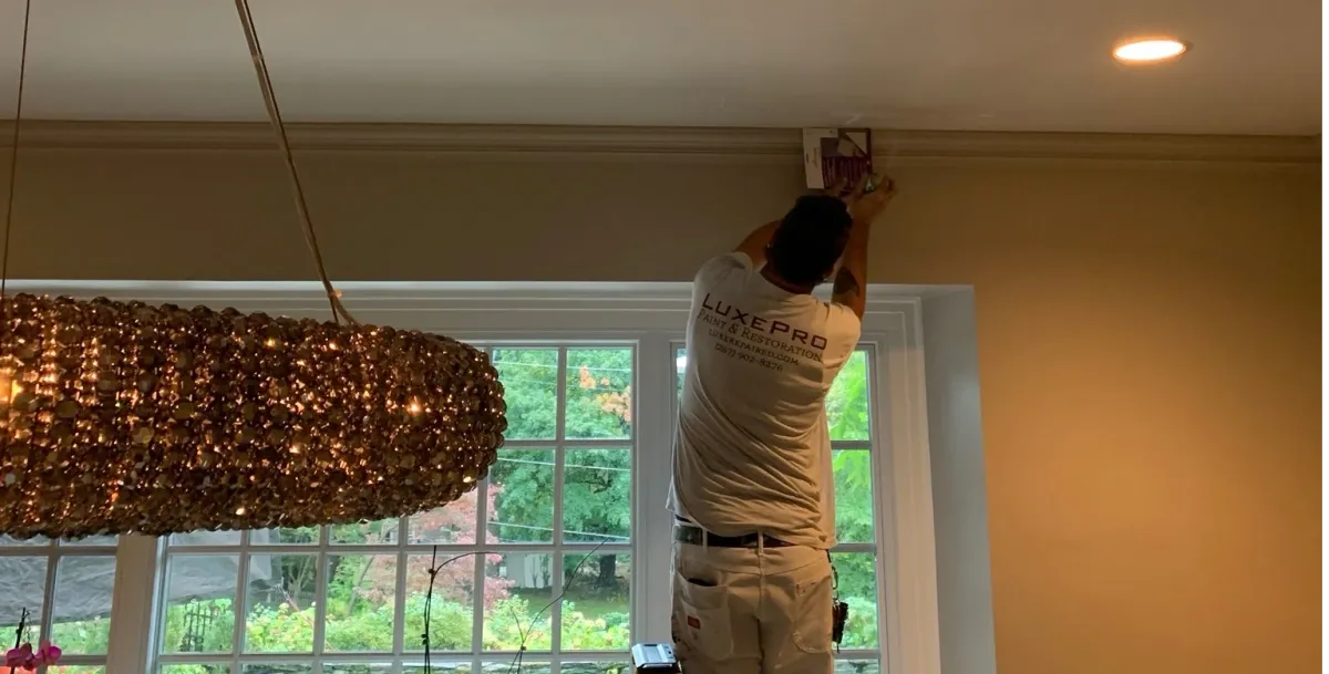 Organized painting and trim installation tools with finish samples