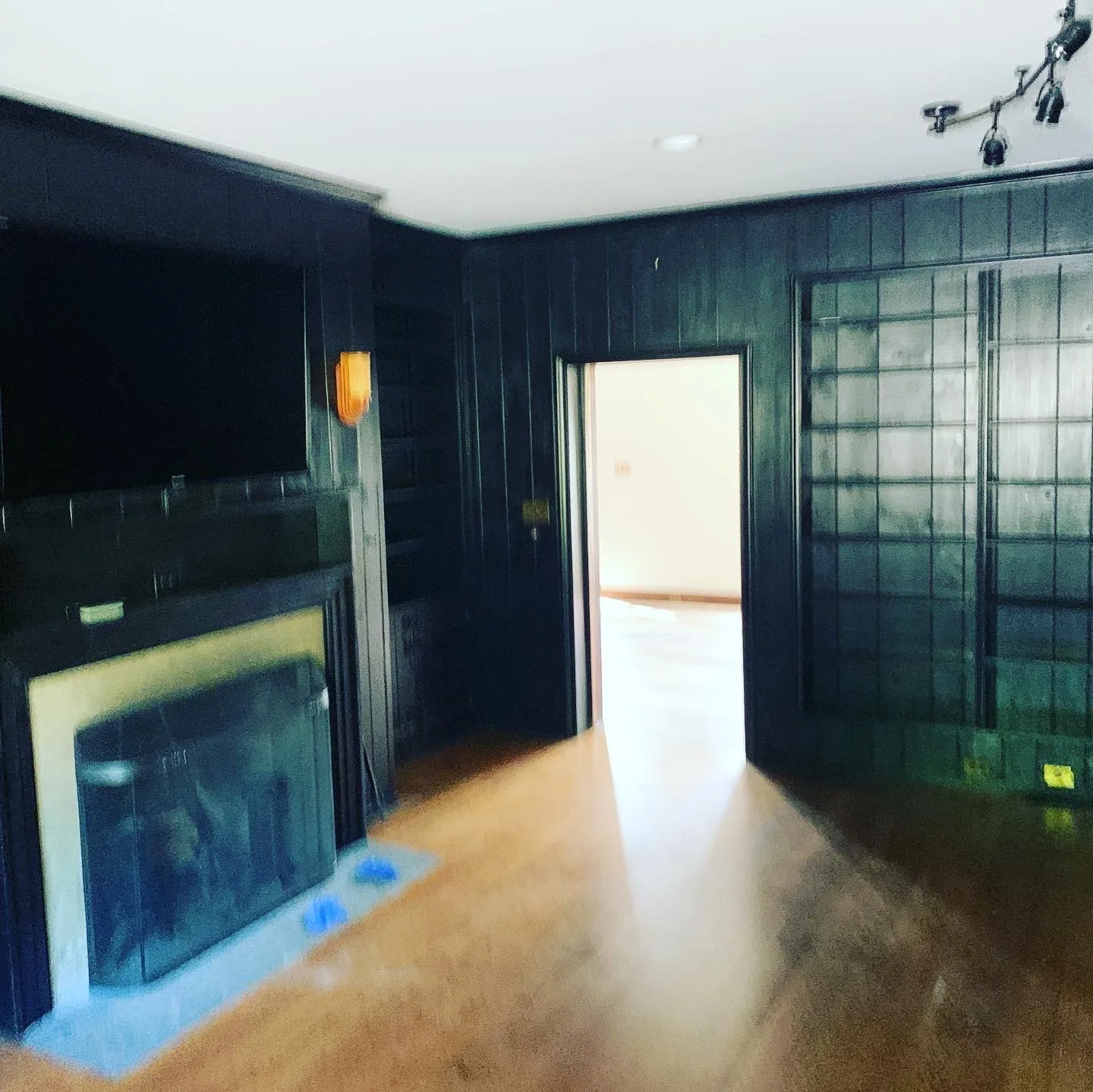 Dark paneled room after a detailed interior finish
