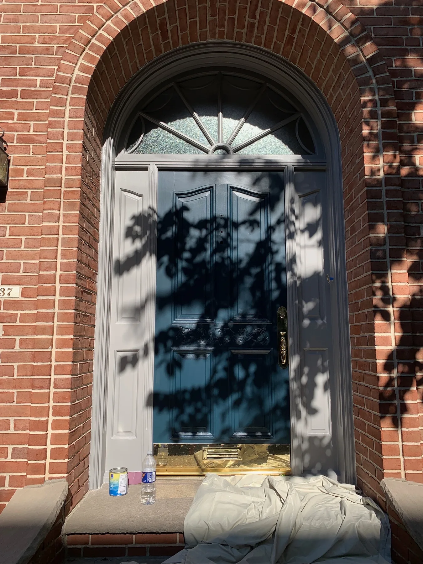 Finished navy front door with restored surround