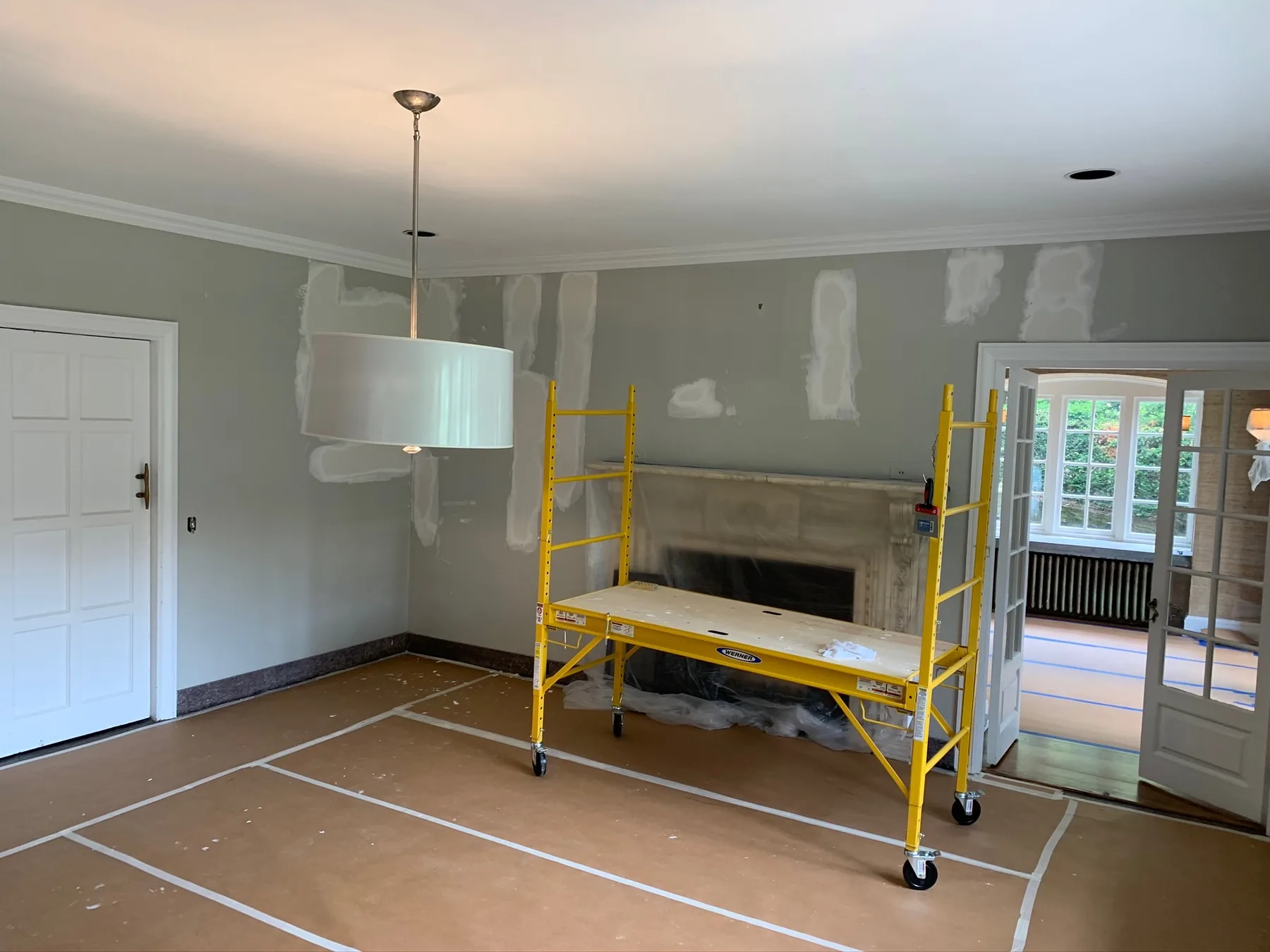 Living room walls prepared for painting