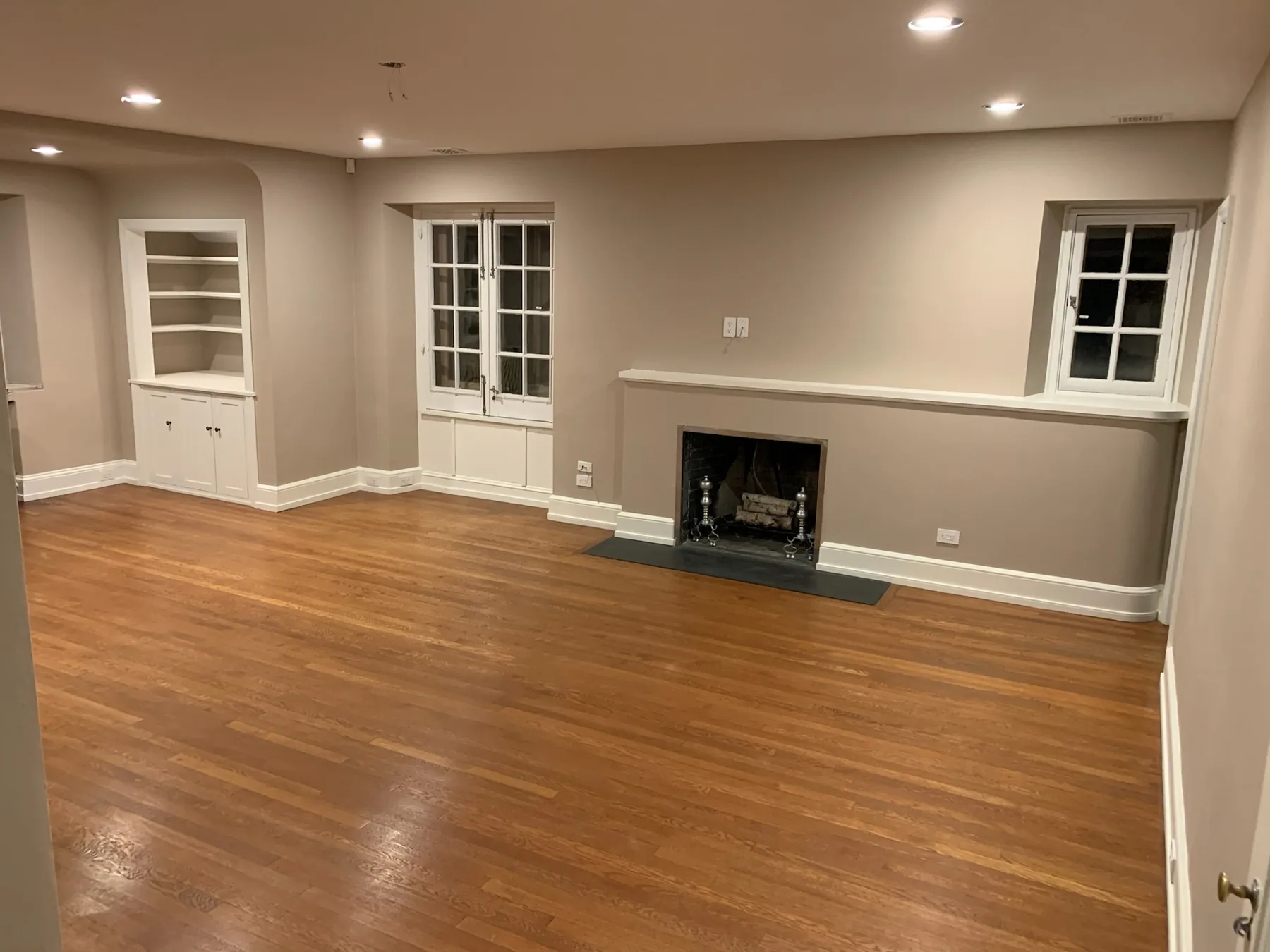 Completed living room with crisp wall and trim lines