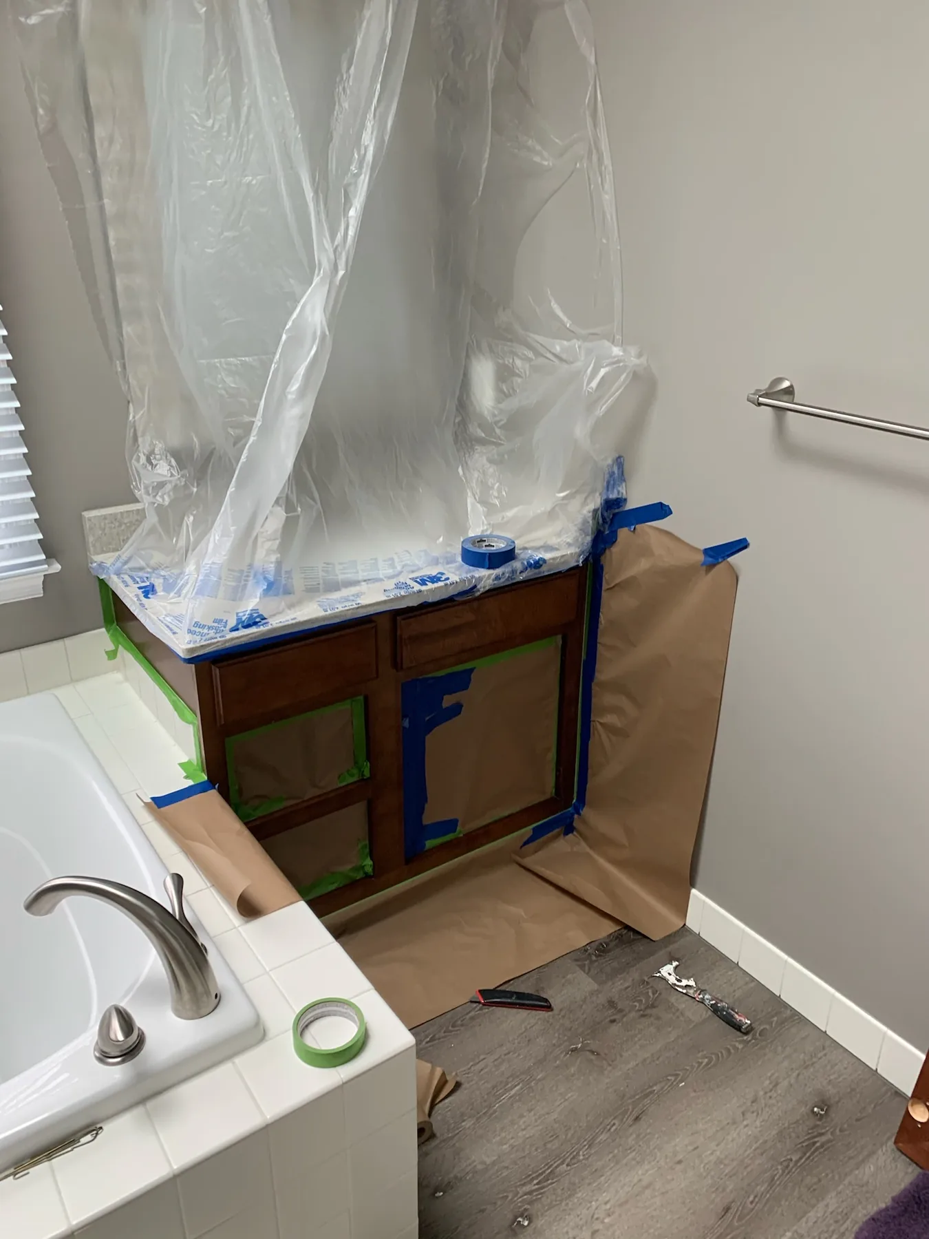 Bathroom fixtures protected before painting
