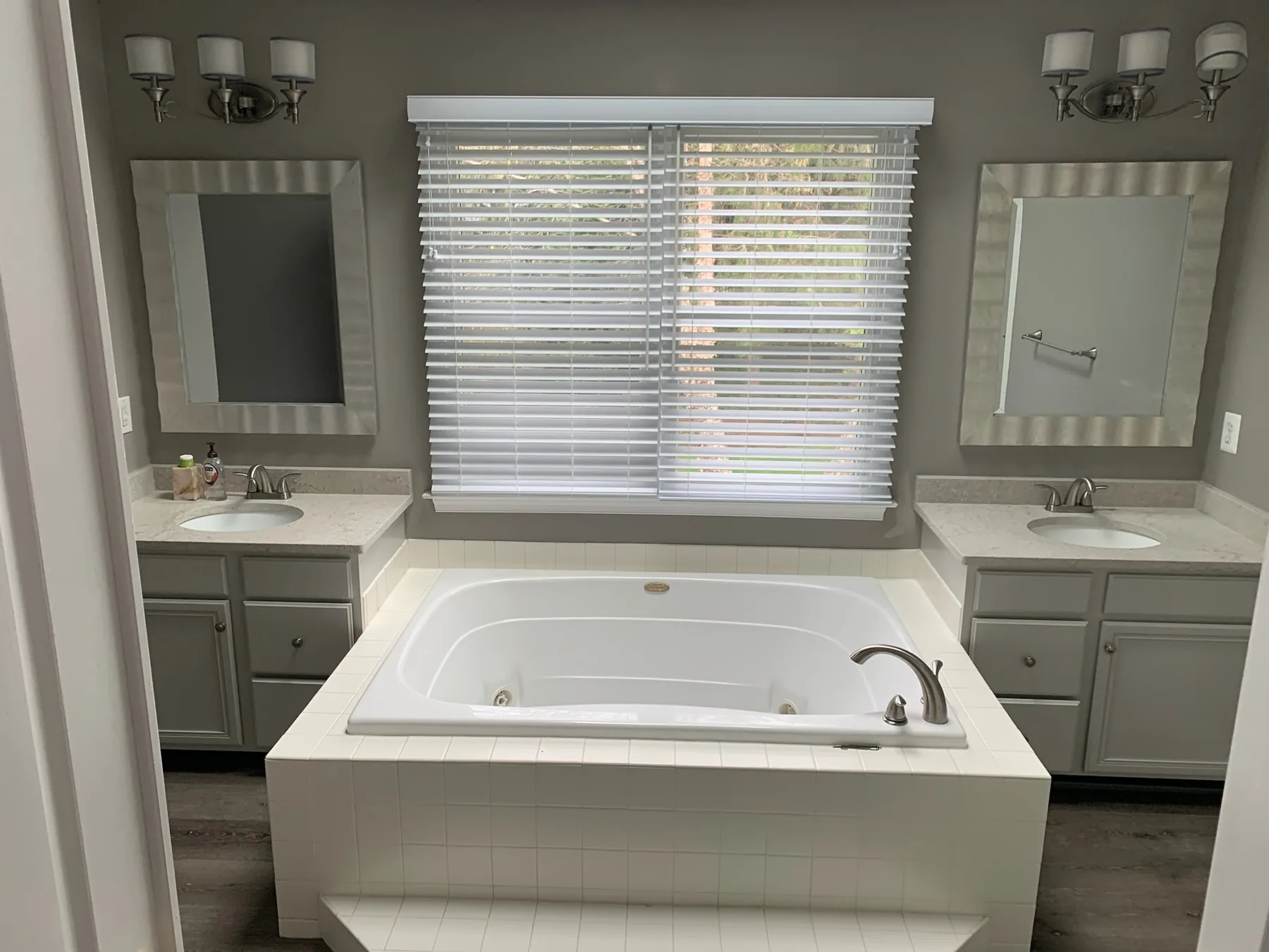 Completed bathroom repaint with clean finishes