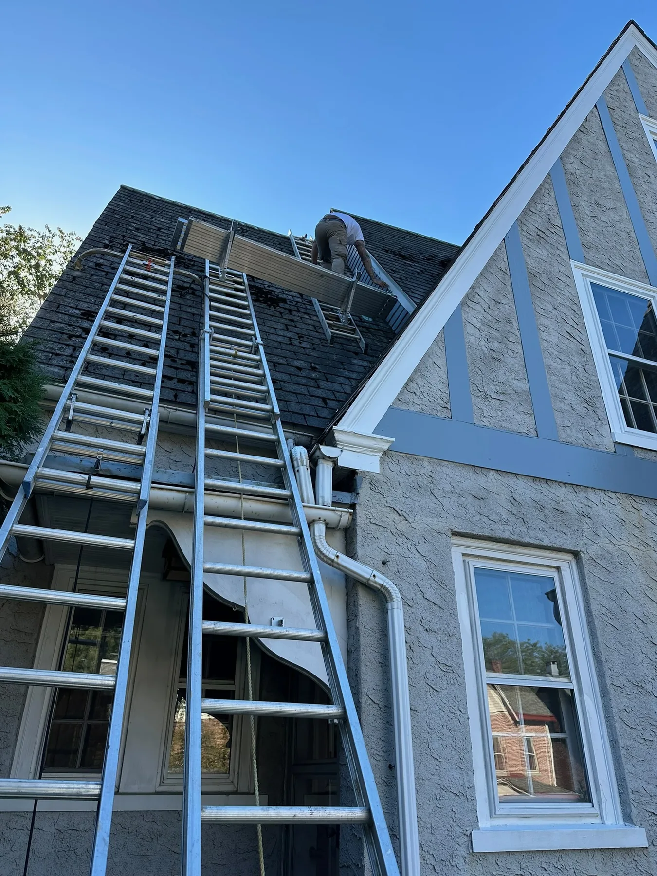 High-access exterior trim work on a period home