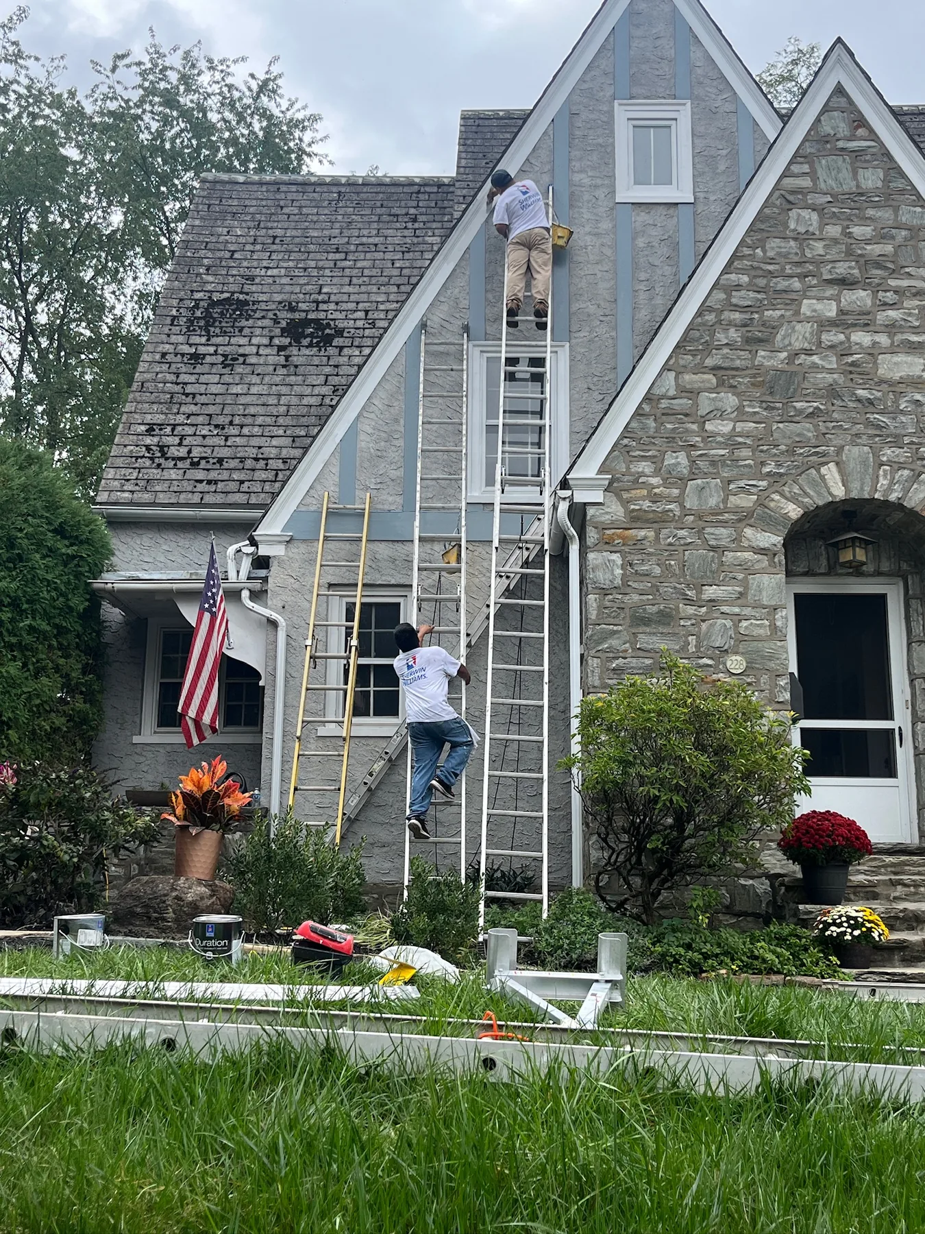 Exterior trim painting on the front gable