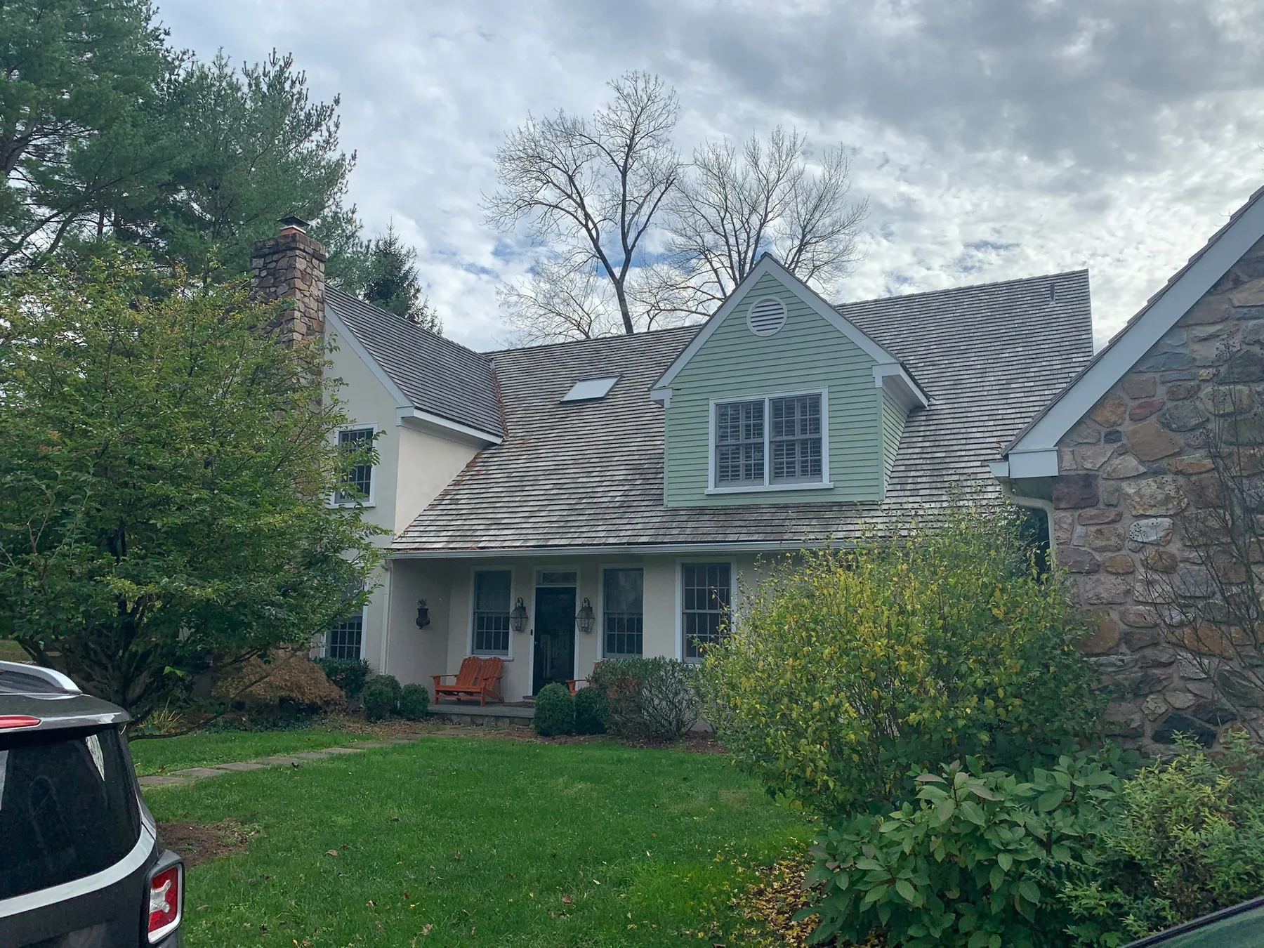 Completed period home exterior after trim painting